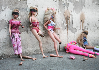 Suspected lead- paint-tainted Barbie dolls face firing squads in China.